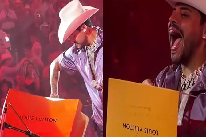 Fan de Eduin Caz le da un costosísimo regalo Louis Vuitton en pleno concierto